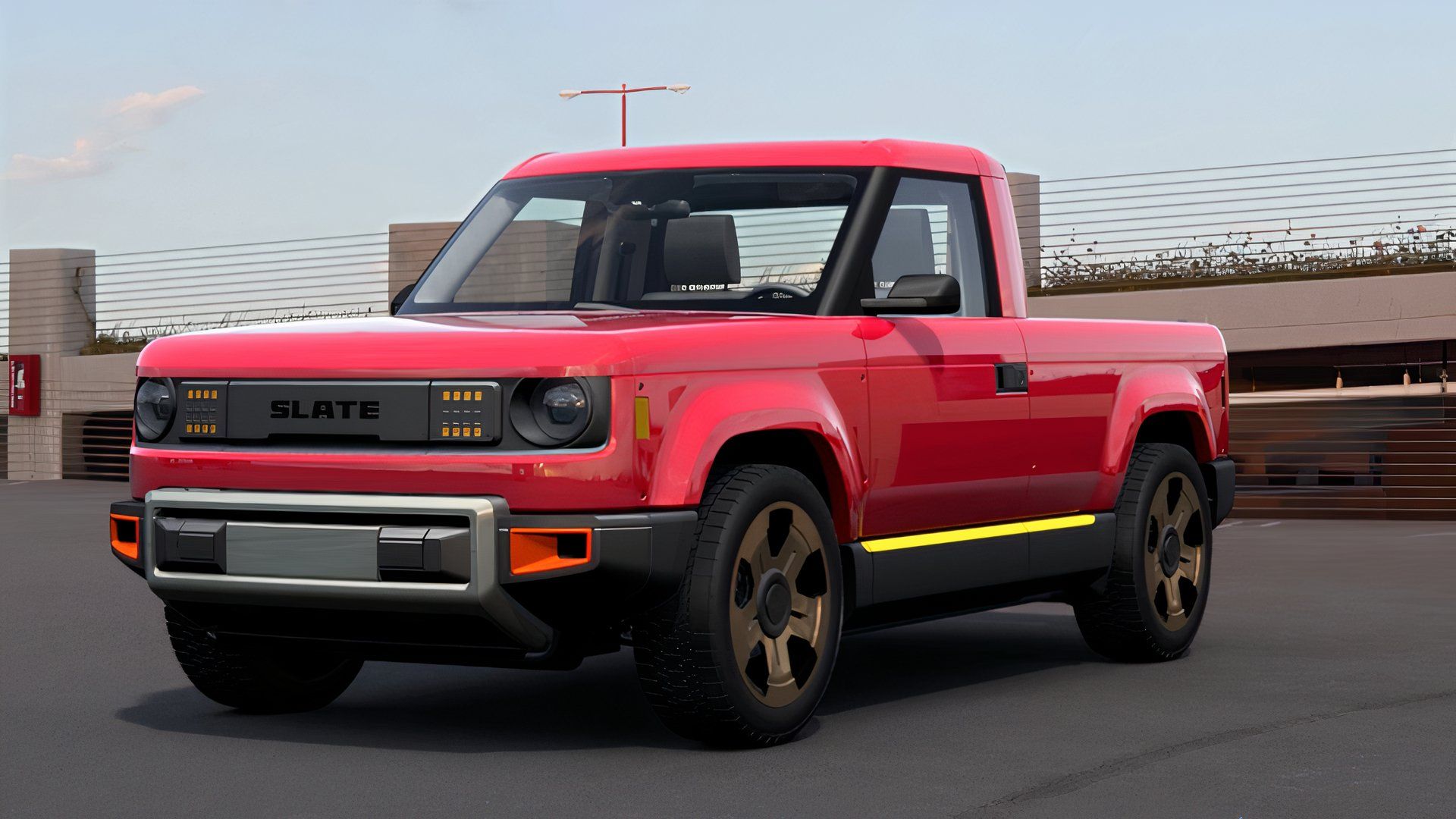 slate truck red front quarter in parking garage